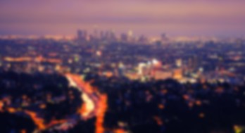 This is a photo of the Los Anglese night skyline, slightly blurred.